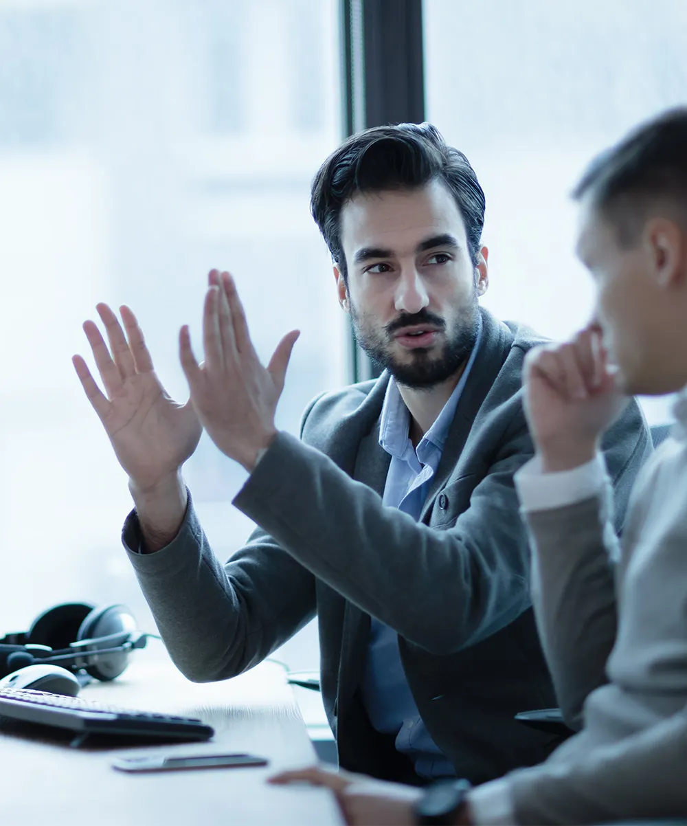 Colleagues discussing ideas in a meeting
